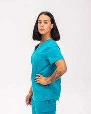 Haut d'uniforme médical à une poche Olivia - Bleu Cyan